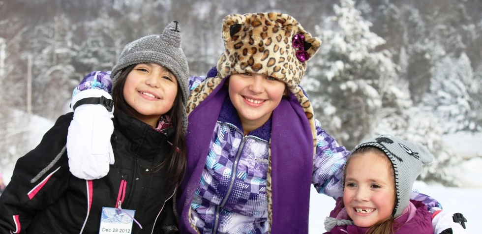 A group of three kids at Titus Mountain Ski Area.