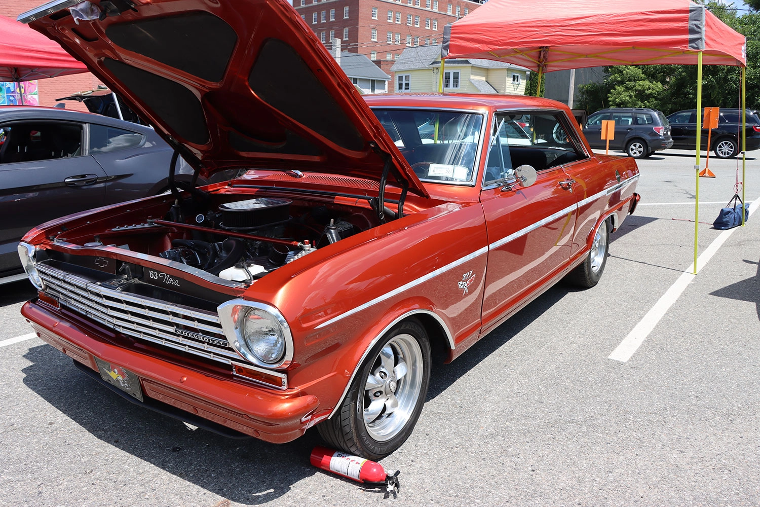 red car hood popped 