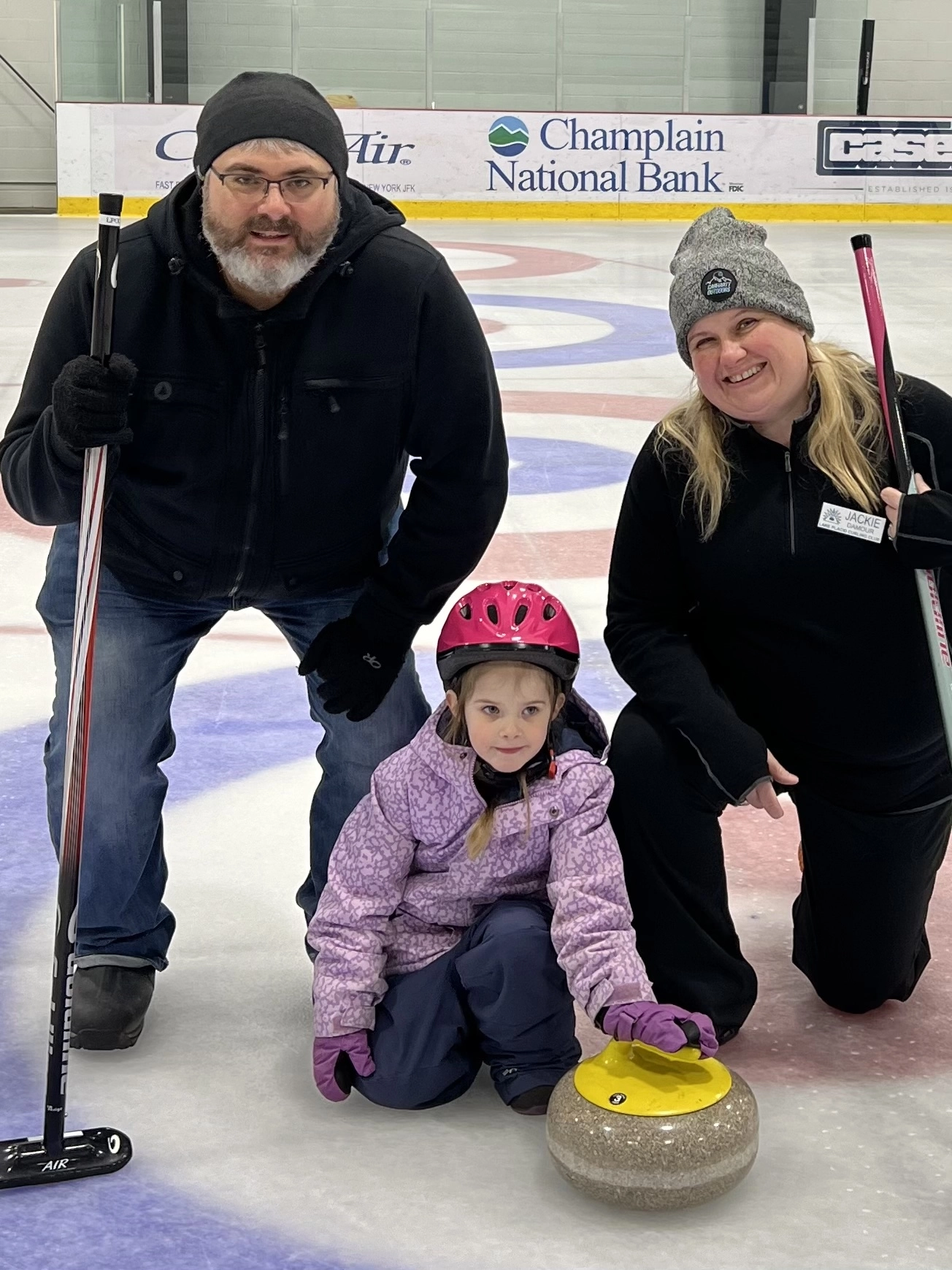 family learning to curl