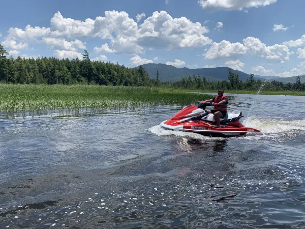 A jet skier by the reeds
