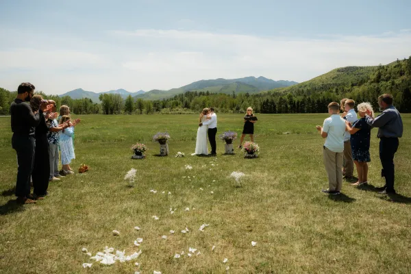An elopement with small gathering at Marcy Field in Keene