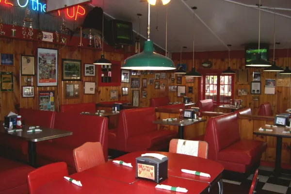 The wood paneled interior of the dining room.