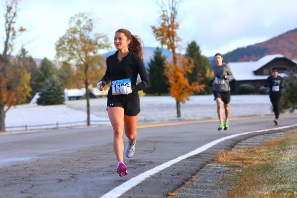 Runner in shorts on frosty fall morning