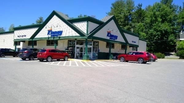 The exterior of Kinneys and the parking lot.