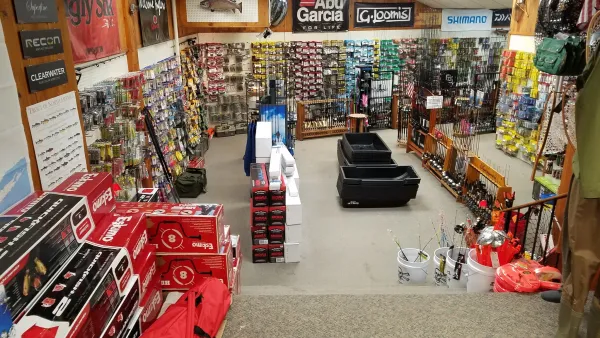 The view of the interior offerings at Blue Line Sports from the stairs that lead up to the camping area.