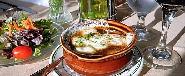 French onion soup with melted cheese.