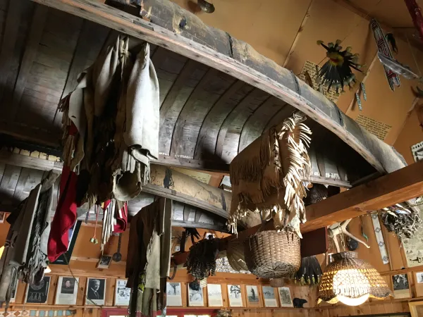 Boats hang from the ceiling