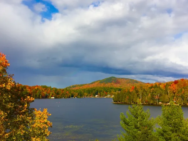 A lake, ringed with fall foliage.