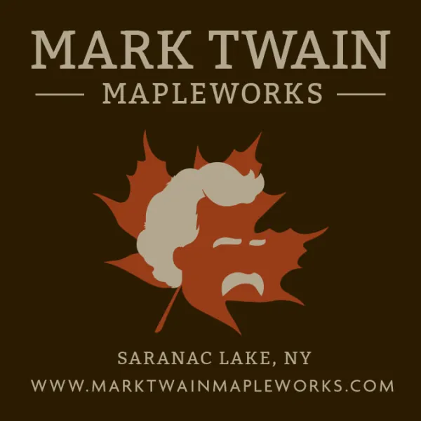 Mark Twain's illustrated likeness on a maple leaf