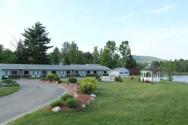 The green lawn outside Sara Placid Inn & Suites.