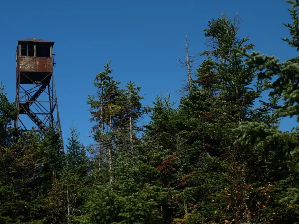 The old, rusty firetower on Loon Lake Mountain