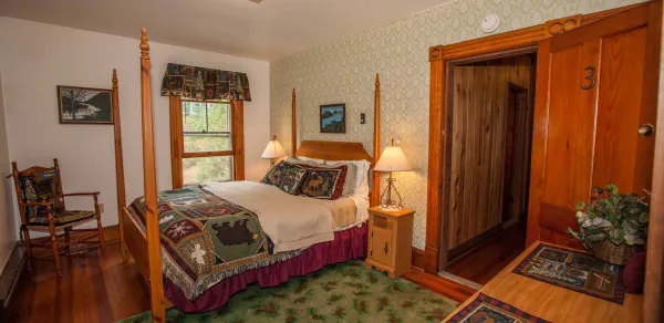A large bed in a cozy bedroom
