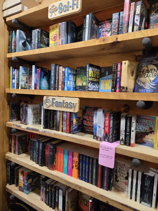 Shelves showcasing Sci-Fi and Fantasy Books