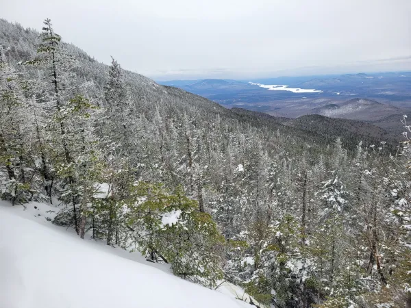 view down towards a long lake in the winter