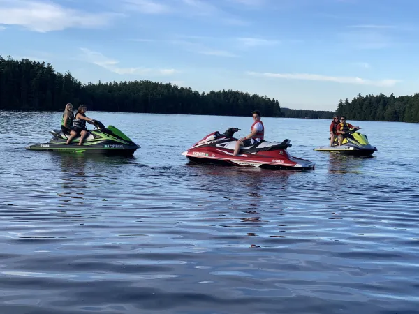 Men on jet skis.