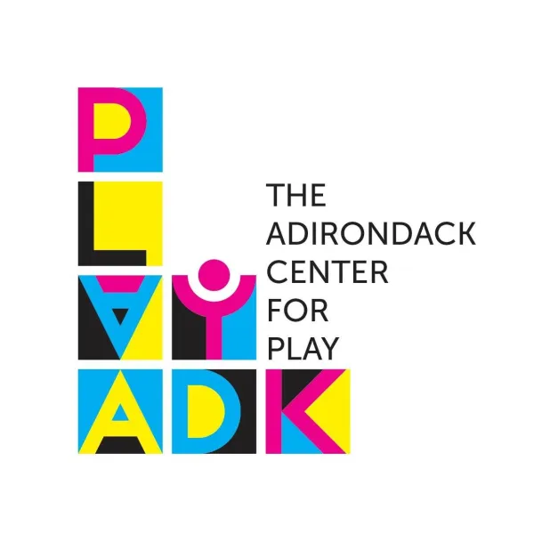 Logo for Play ADK with colorful blocks stacked to spell their name