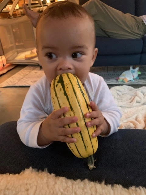 A young person enjoying local produce