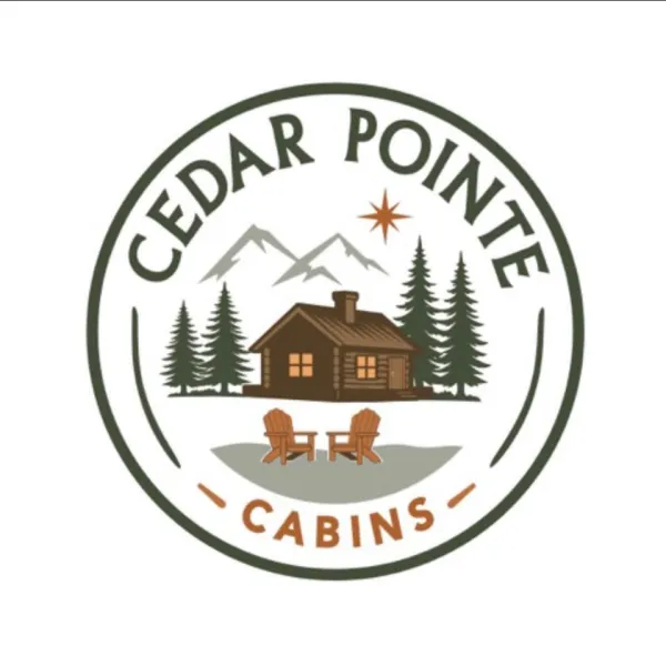 A log cabin with pine trees, mountains, adirondack chairs and a starry night surrounded by Cedar Pointe Cabins.