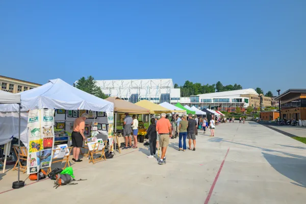 Vendor line up with customers shopping