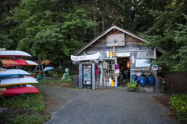 A small structure surrounded with adventure gear.