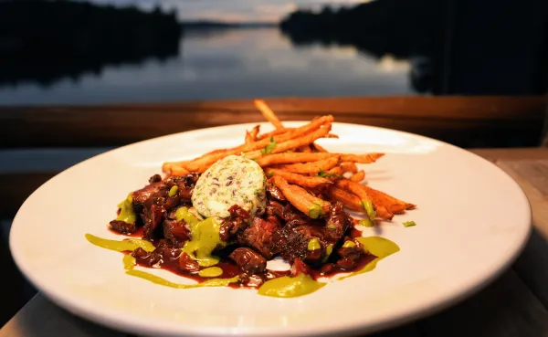 A fresh and delicious meal on a plate, lakeside.