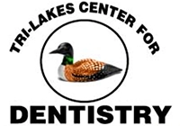 A duck in a circle surrounded by the word
