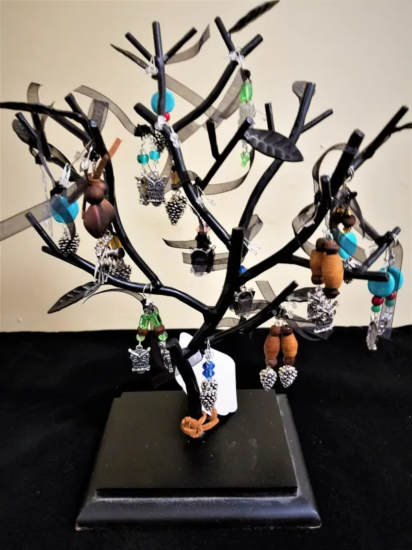 Costume earrings on a tree 