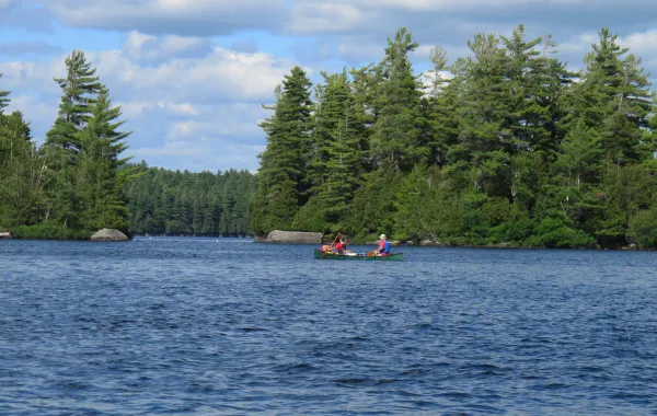 People paddling to their campsite on Lower Saranac Lake