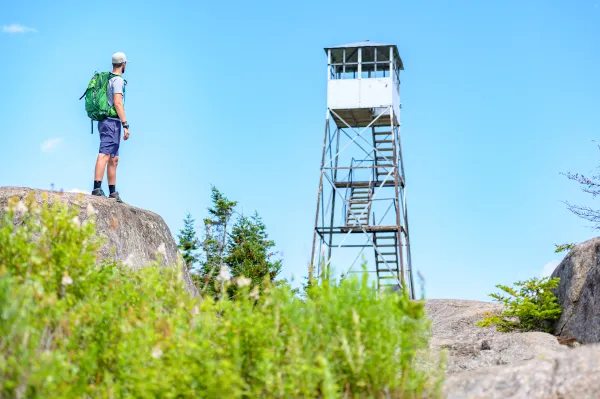 A man below a firetower