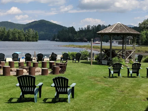 Chairs on the lawn by the lake.