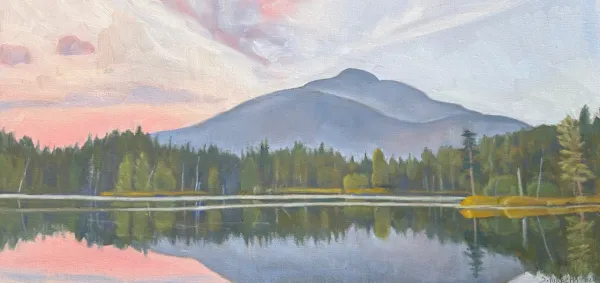 A painting of a mountain scene, reflected in a lovely lake with pink sunset sky.
