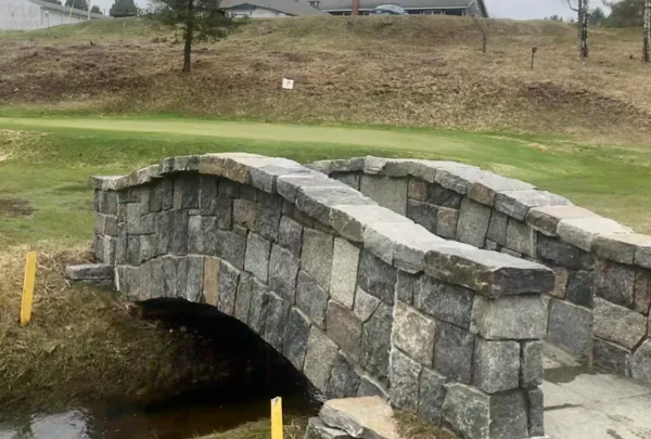 A stone bridge at the golf course.