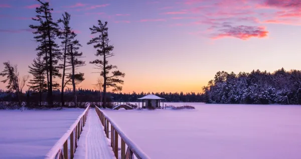 A winter sunset turns the vista purple at White Pine Camp.