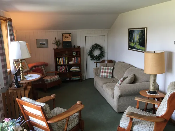 A cozy living room with ample seating.