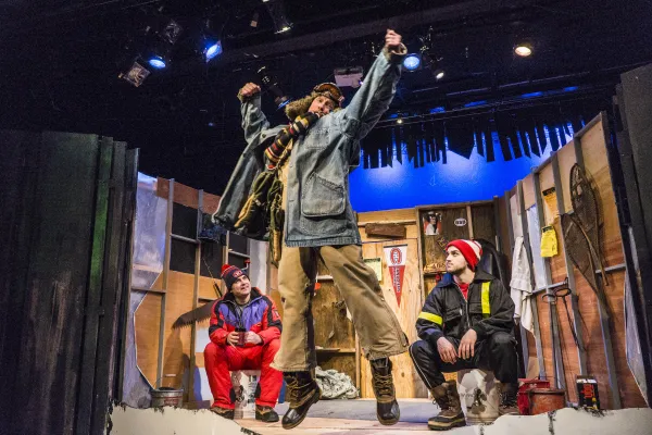 A play with the staging set to emulate an ice fishing hut.