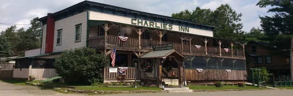 The front of Charlies Inn in the warm season.