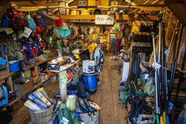 Shelves packed with colorful adventure gear.
