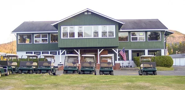 The golf house with carts out front.